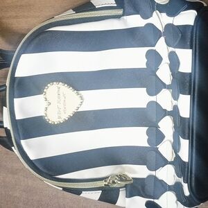Chic Striped Backpack with Heart Accents
